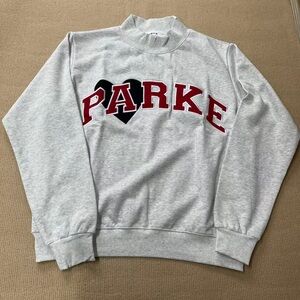 Parker Gray Crewneck Sweatshirt with Red Lettering and Black Heart